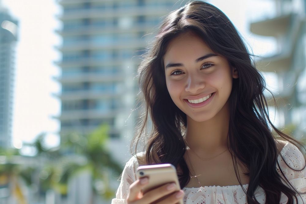 Young latin female smile happy phone.