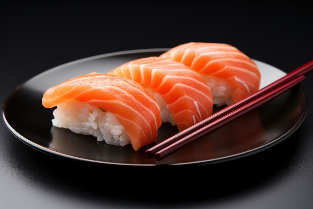 Chopsticks salmon sushi seafood.