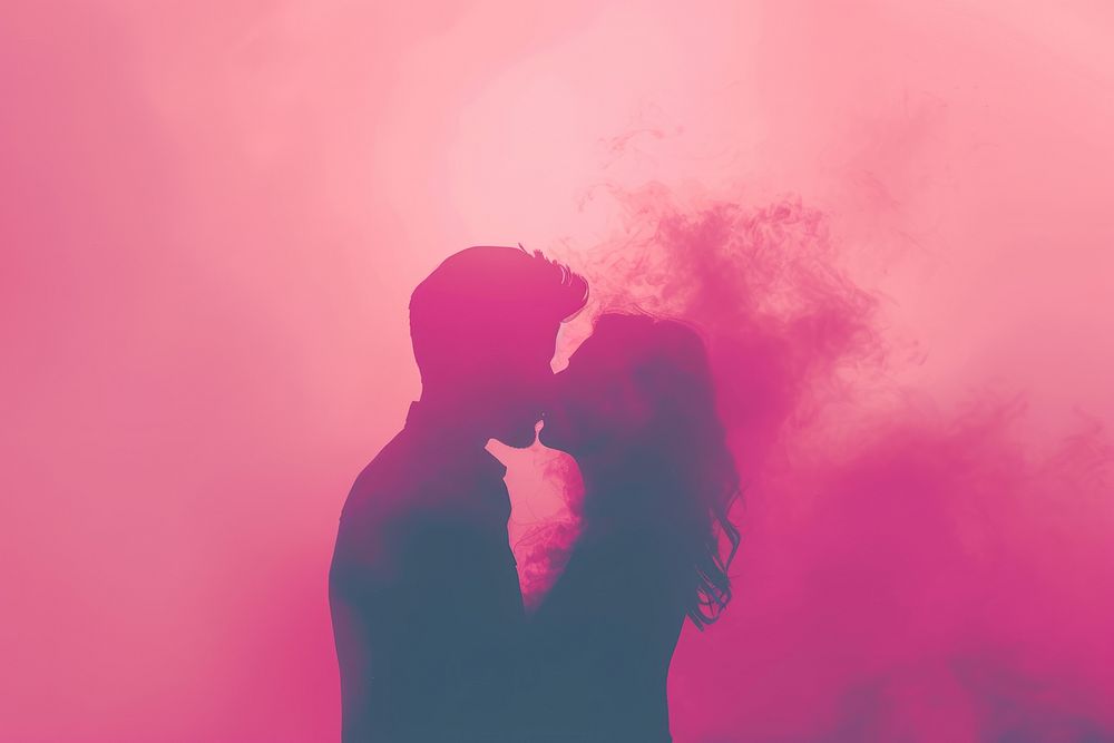 Kissing couple in gradient background silhouette romantic photo.