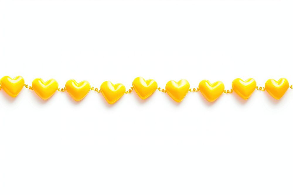 Yellow mini heart jewelry line white background.