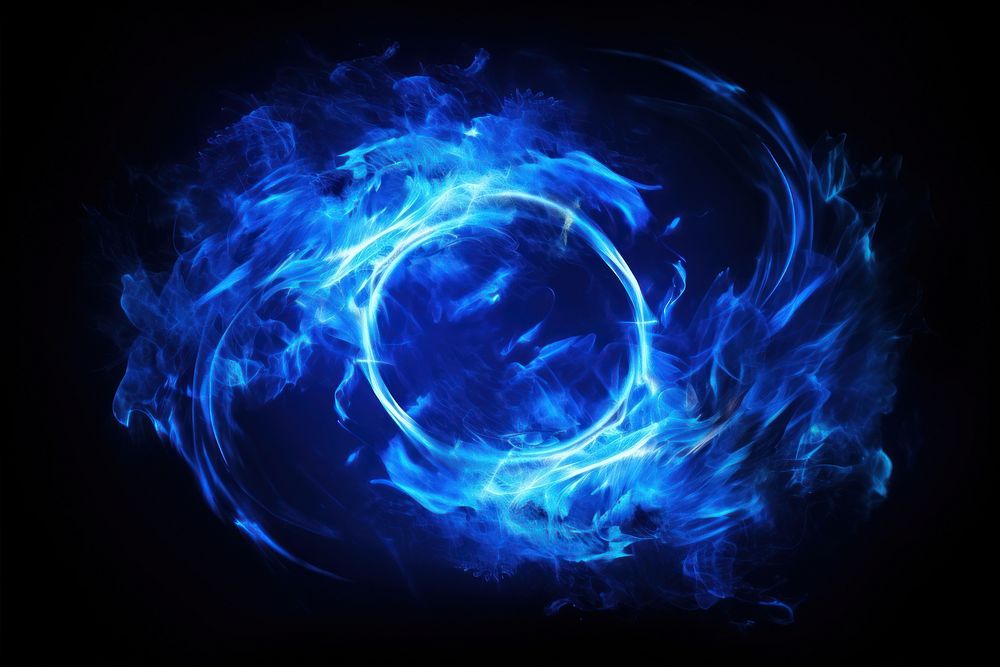 Photo blue fire in spiral line pattern burning light.
