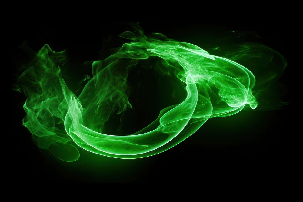 Photo green fire in spiral twist line burning light illuminated.