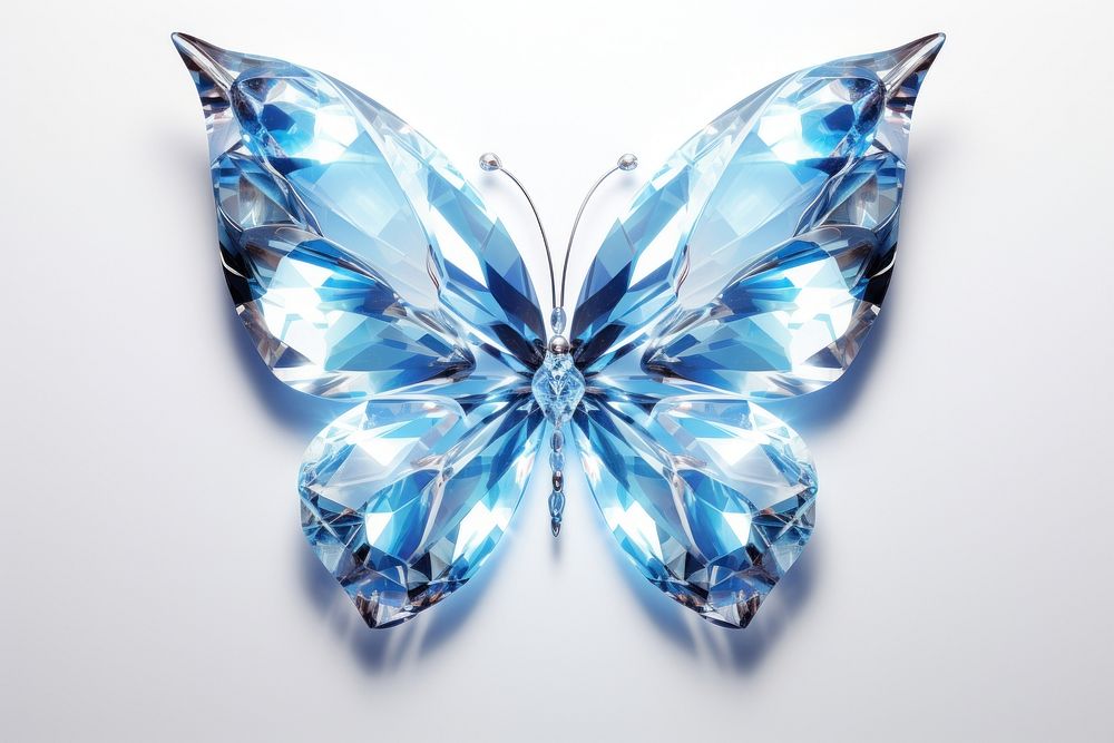 Butterfly gemstone crystal white background.