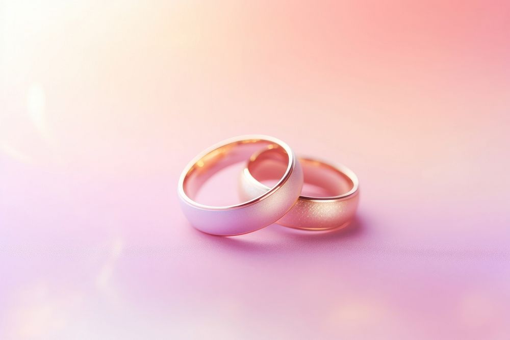 Wedding rings background jewelry pink togetherness.