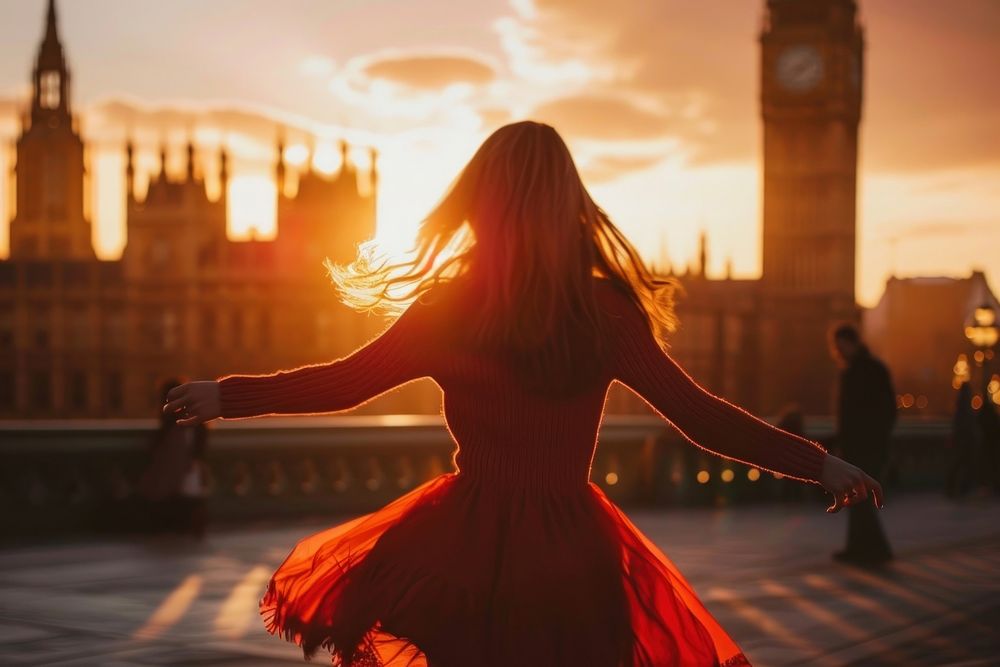 Photography of a woman dancing architecture cityscape.