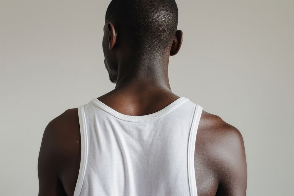 Blank white tank top back exercising hairstyle.