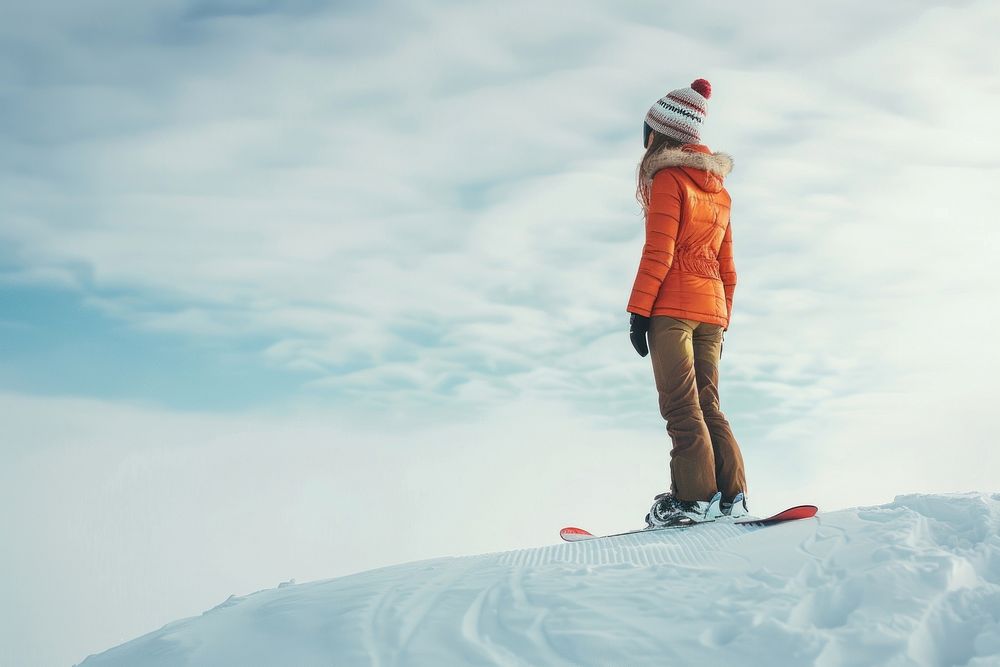Woman stand on snowboard outdoors recreation winter.