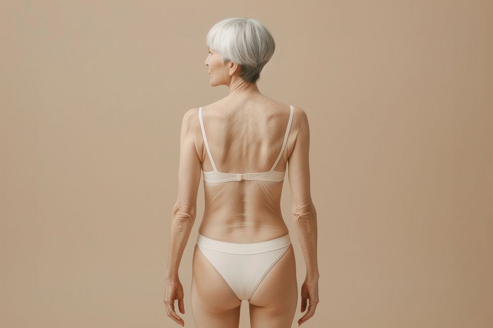 Woman wear blank cream swim suit back underwear lingerie.