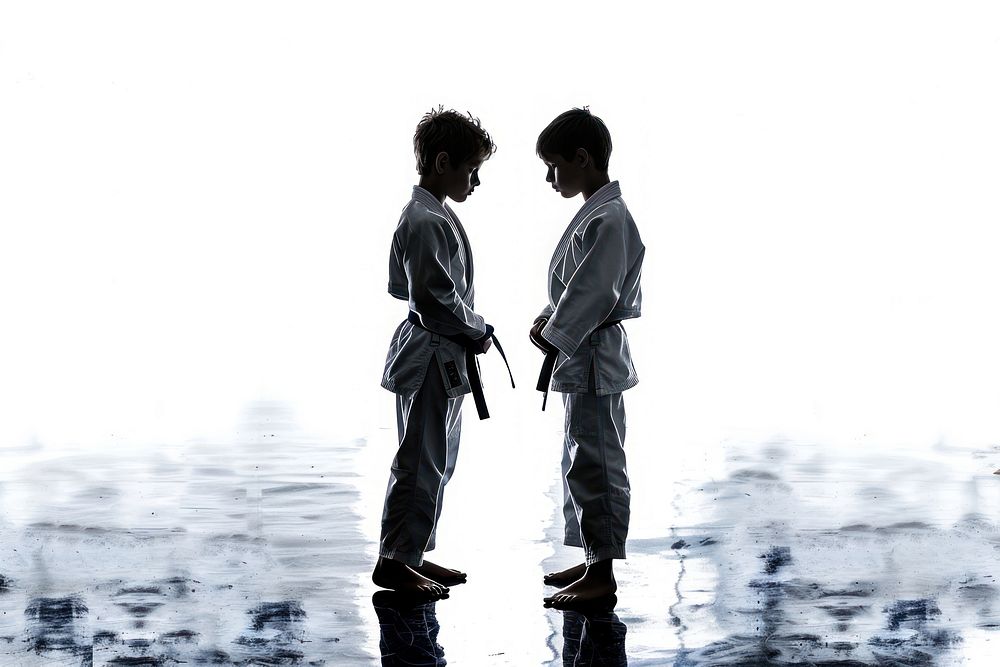 Boys judo fighters in sports hallin silhouette photo togetherness photography.