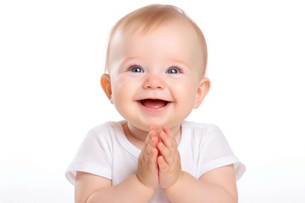 Happy baby clapping portrait photo white background.