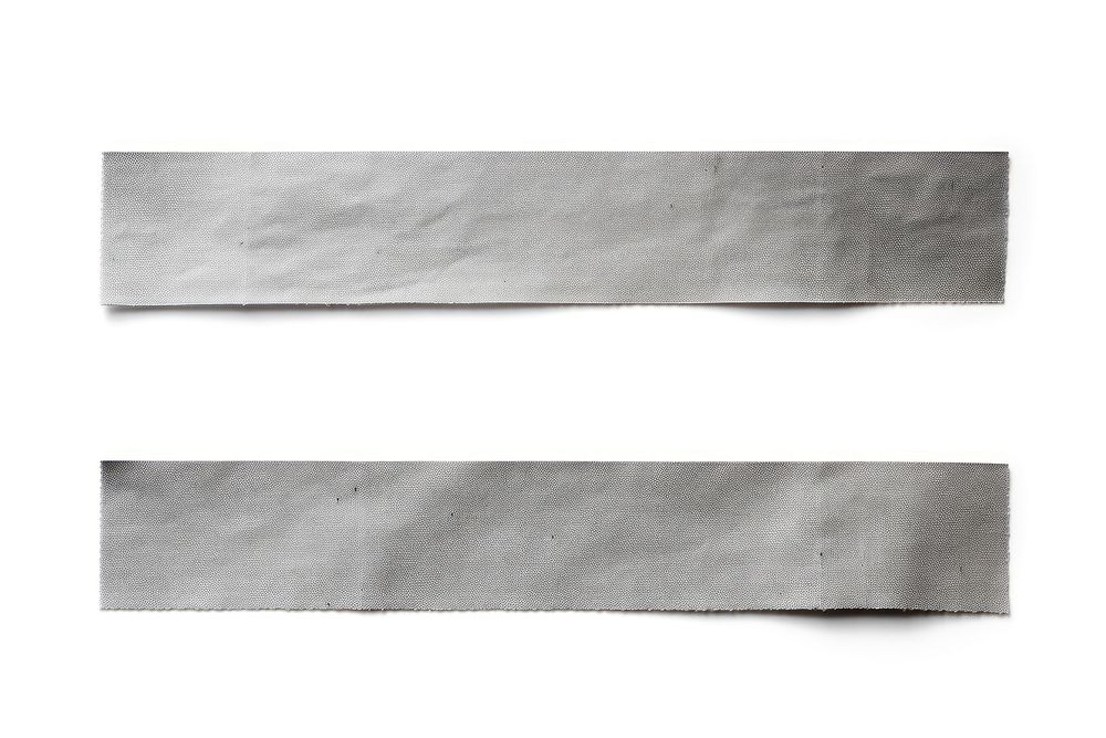 Grey adhesive strip paper white white background.