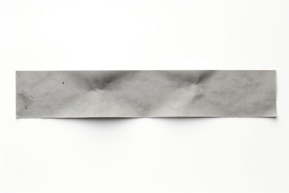 Grey adhesive strip paper white background rectangle.