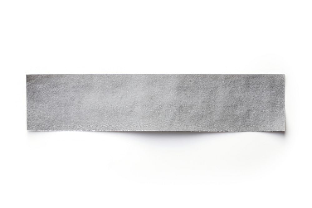 Grey adhesive strip paper linen white background.
