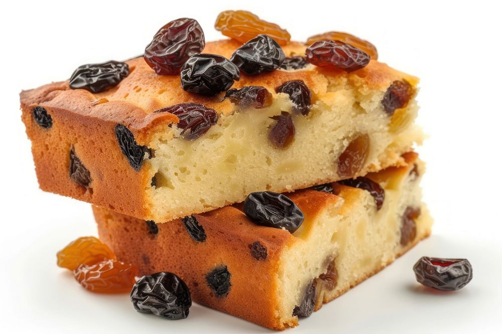 Cake containing raisins prunes and dried apricots food white background fruitcake.