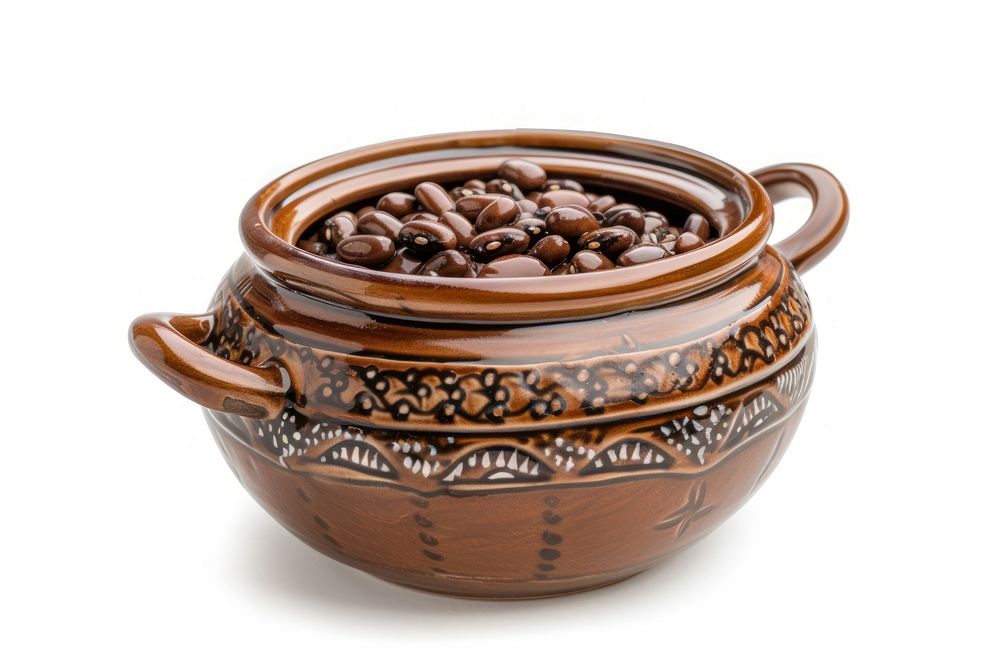 Ceramic pot with cooked carioca beans pottery bowl white background.