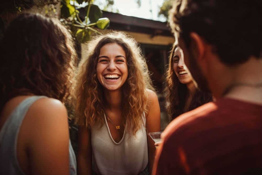 Close up of person interacting with friends laughing adult togetherness.
