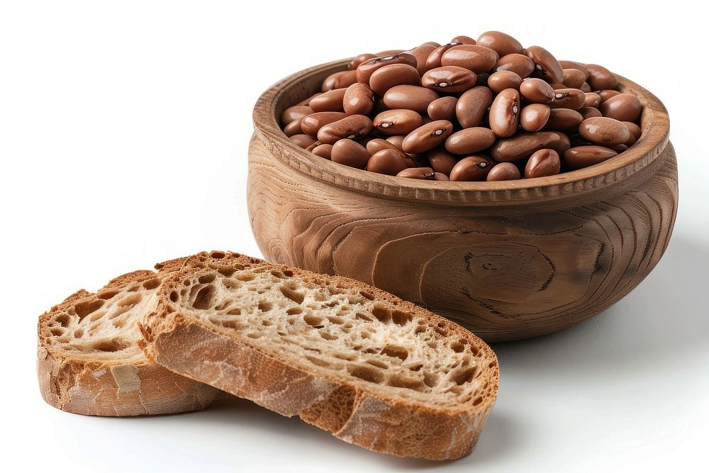 A bowl of pinto beans is paired with a slice of bread food white background container.
