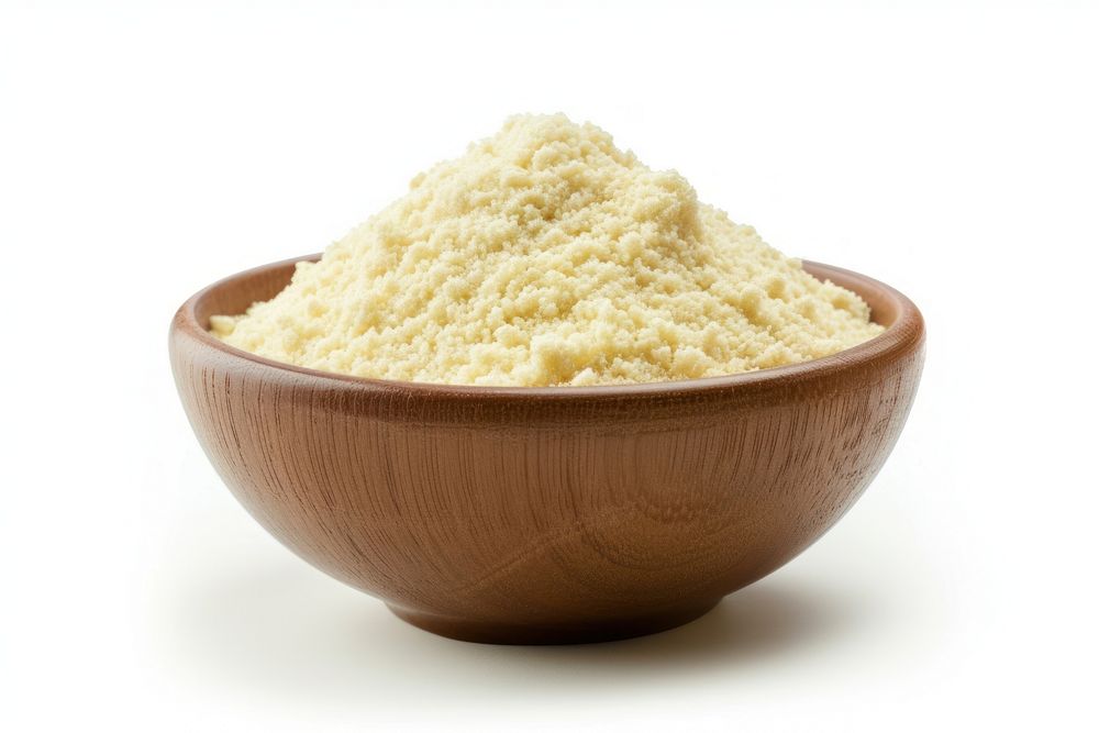 A bowl of semolina flour powder food white background.
