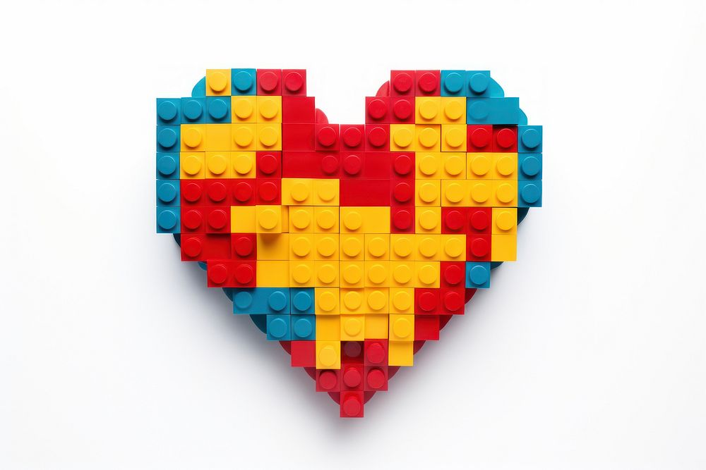Heart made with toy block creativity yellow.