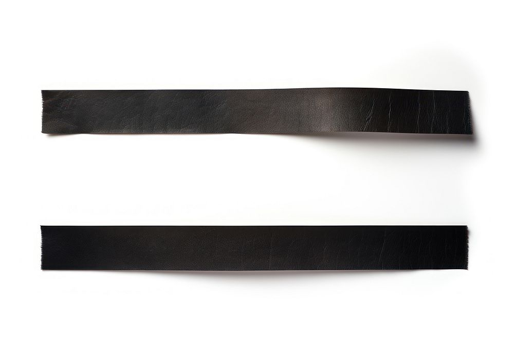 Black adhesive strip belt white background accessories.