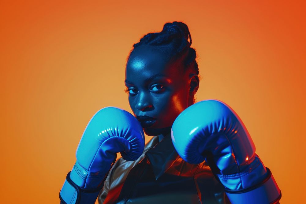 Women professional boxer Wearing blue shining Boxing Gloves portrait boxing glove.