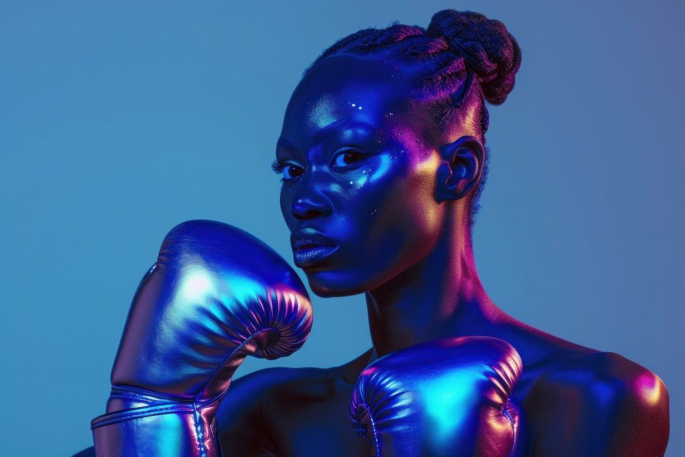 Women professional boxer Wearing blue shining Boxing Gloves boxing adult boxing glove.