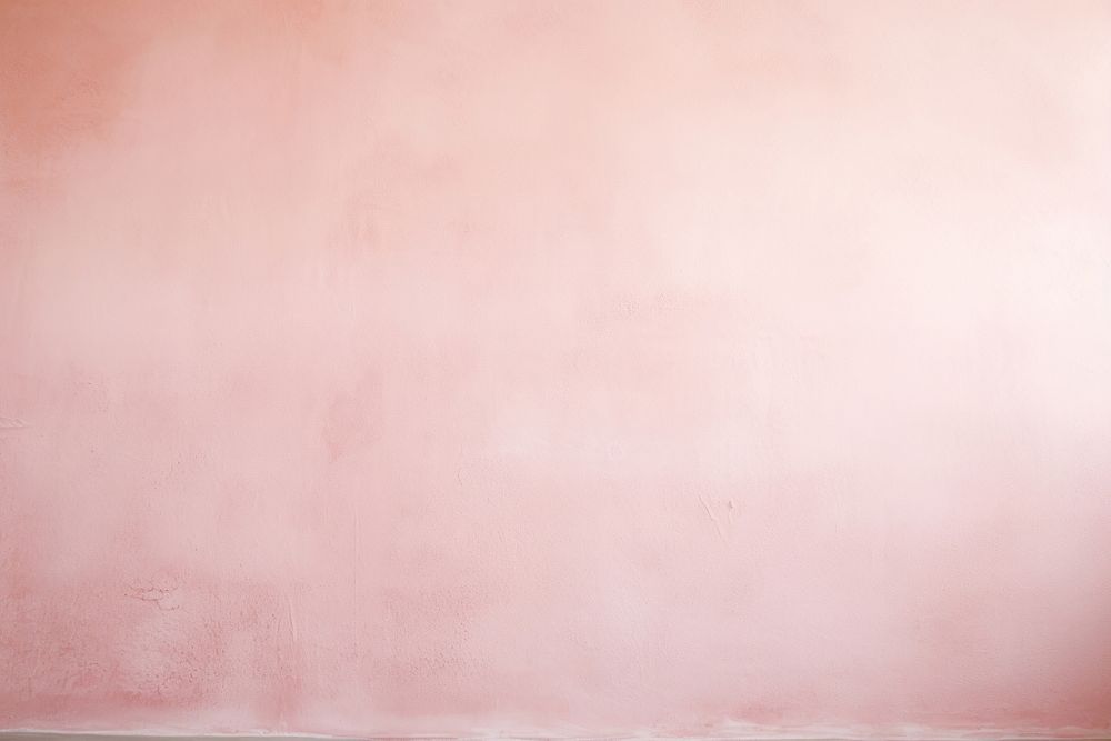 Pastel pink plaster wall architecture texture.