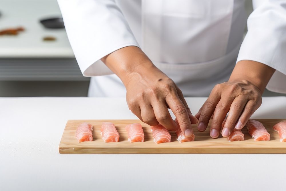 Japanese chef making sushi cooking hand food.