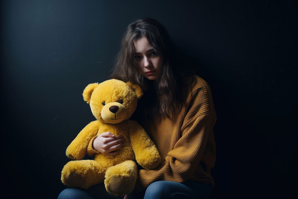 Holding teddy bear portrait yellow adult.