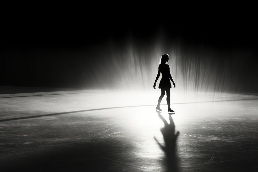 Ice skating silhouette sports light.