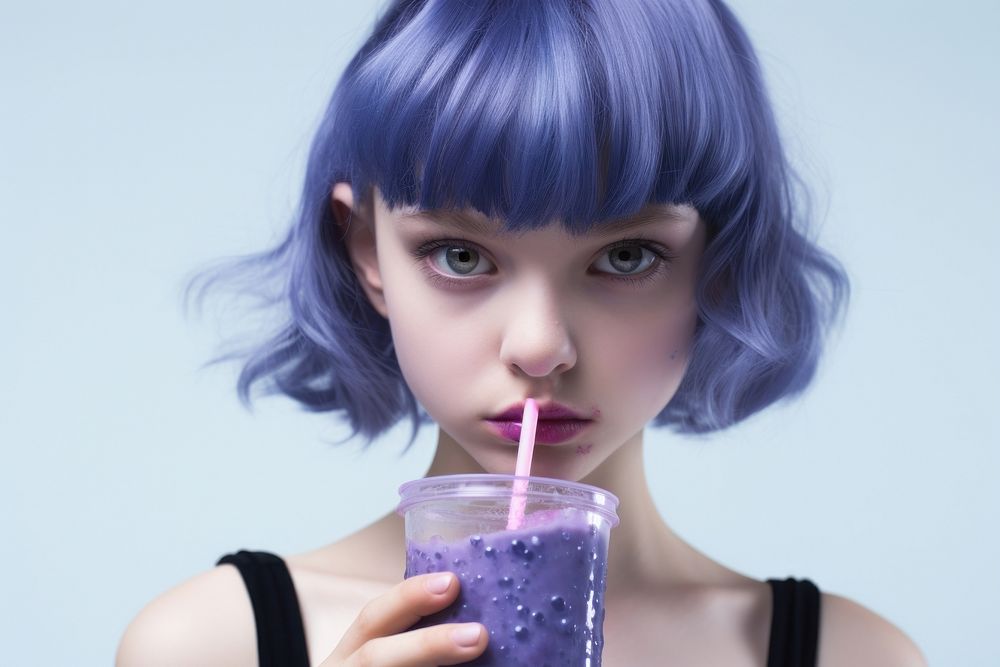 Girl drinking blueberry smoothie refreshment disposable hairstyle.