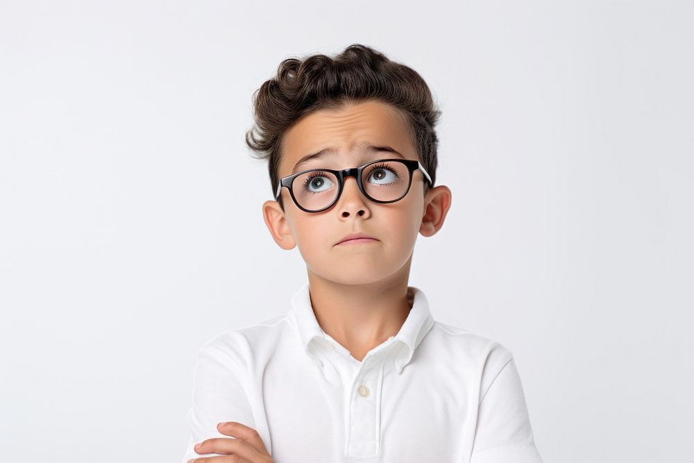 Kid with confused face portrait glasses photo.