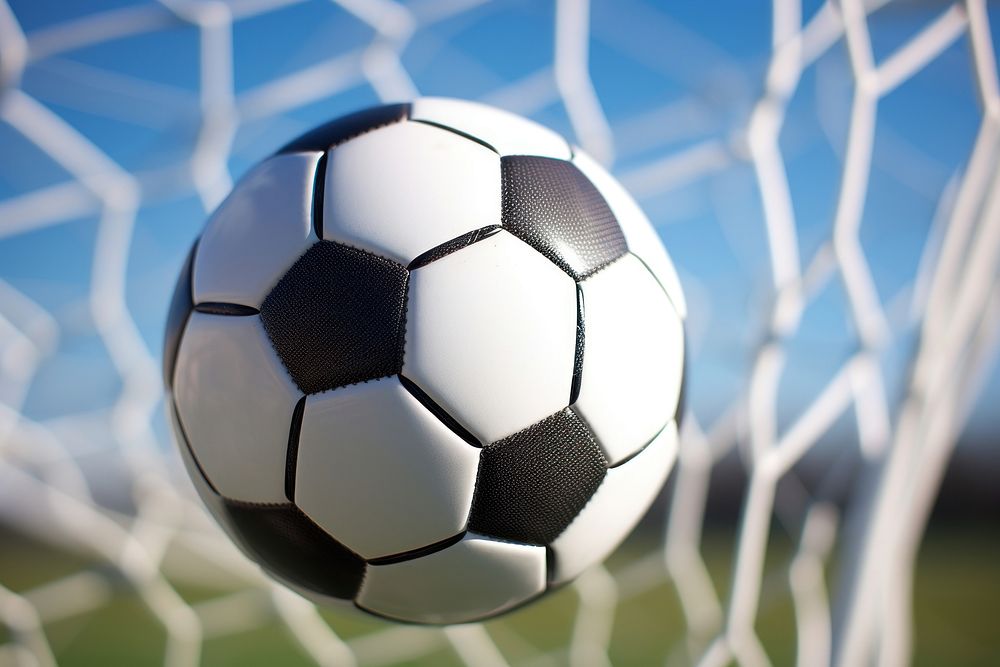 Soccer ball in goal net soccer football sports.