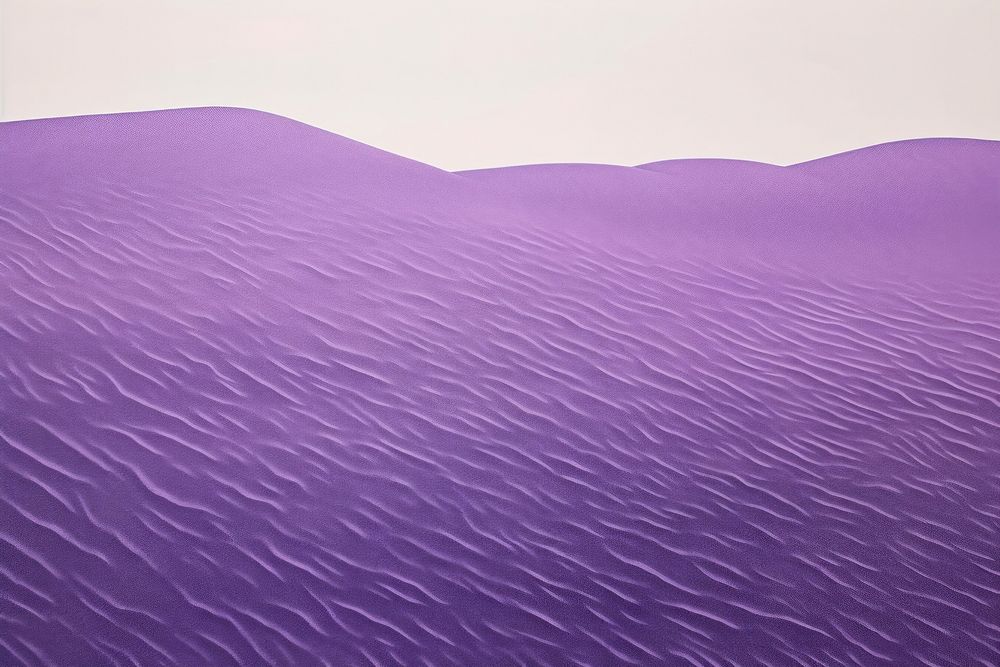 Purple sand dune backgrounds textured outdoors.