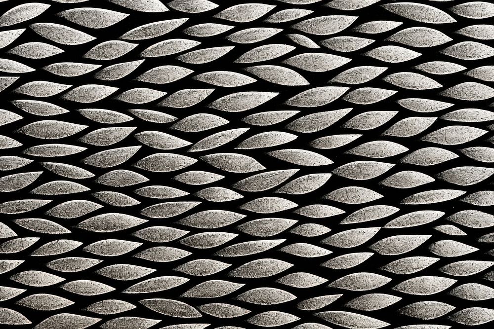 Silkscreen anchovy fish pattern backgrounds textured black.