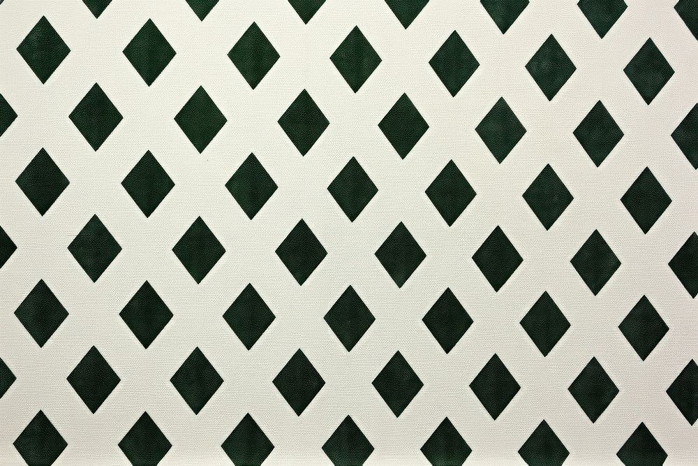 Harlequin pattern green backgrounds textured.