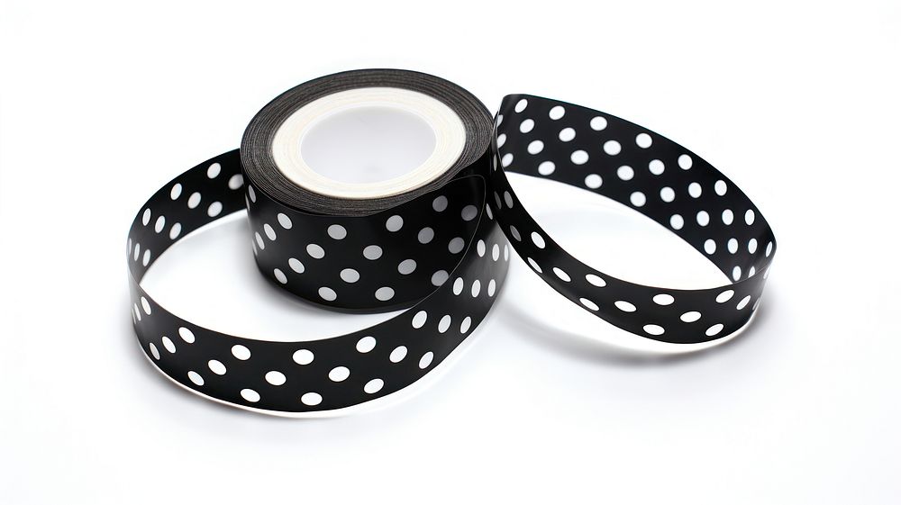 Polka dot pattern adhesive strip black white background spotted.