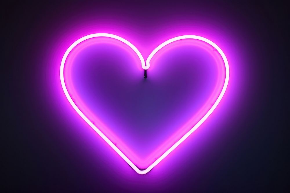 Heart neon sign light glowing purple.