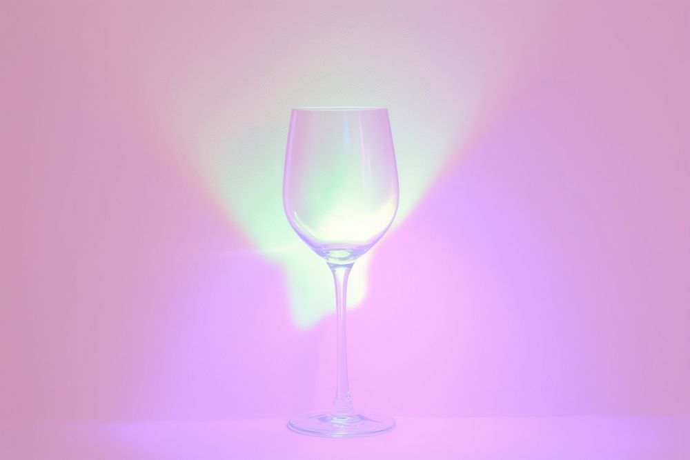 Pastel neon wine glass light illuminated refreshment.