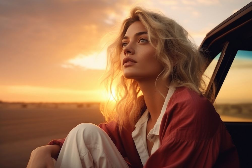 One young blonde attractive woman sitting portrait looking.