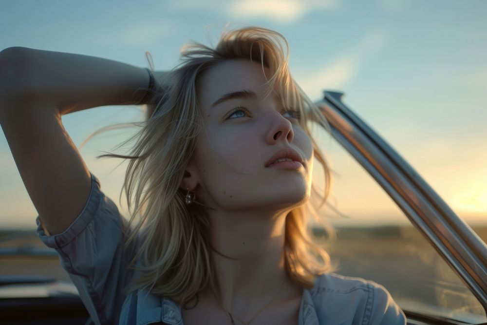 One young blonde attractive woman portrait looking sunset.