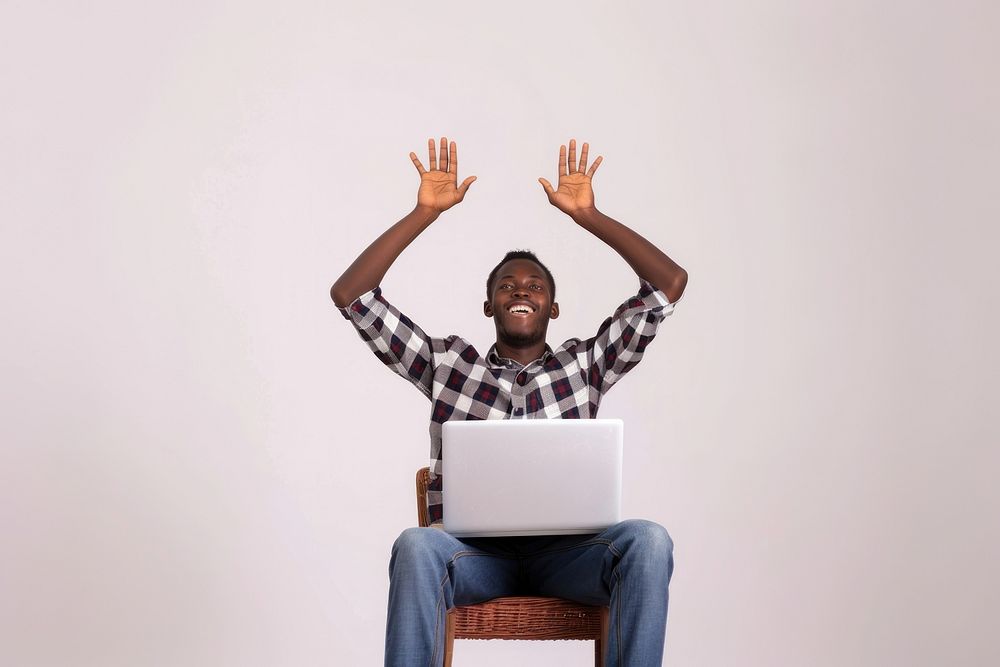 Africa teenage man sit on chair laptop computer adult.