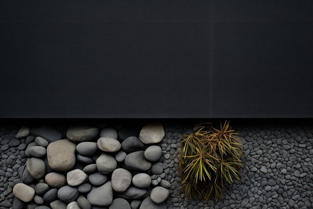Black and gravel pebble wall architecture.