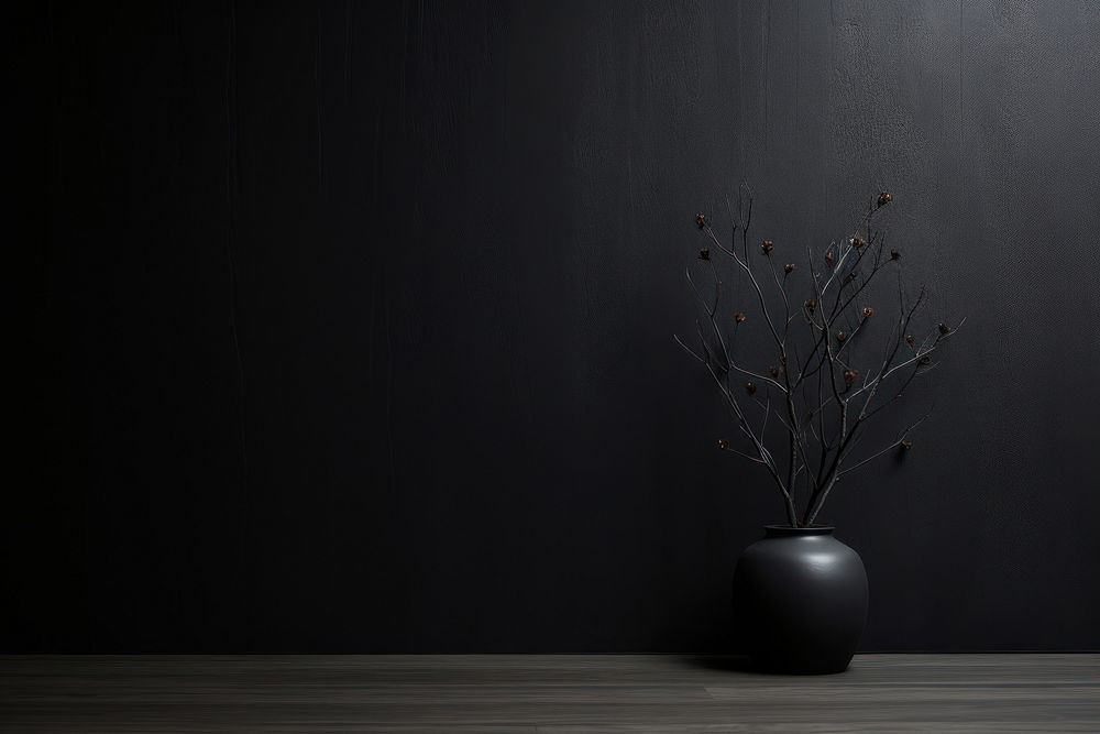 Black wall plant vase.