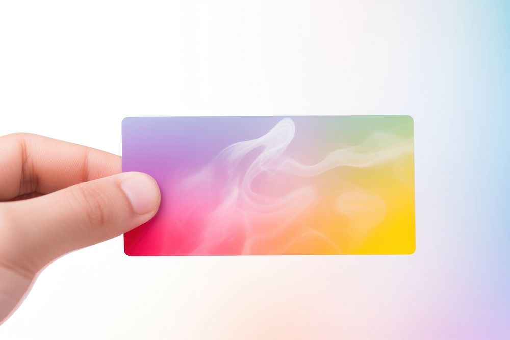 Fingers hold rainbow namecard white background abstract holding.