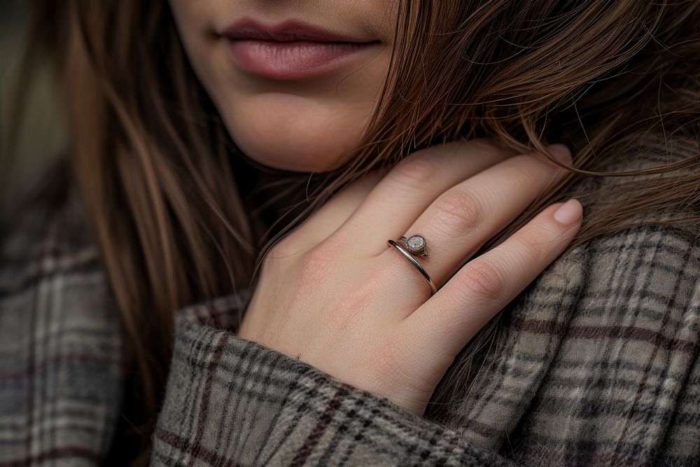 Beauty woman nails jewelry diamond ring.