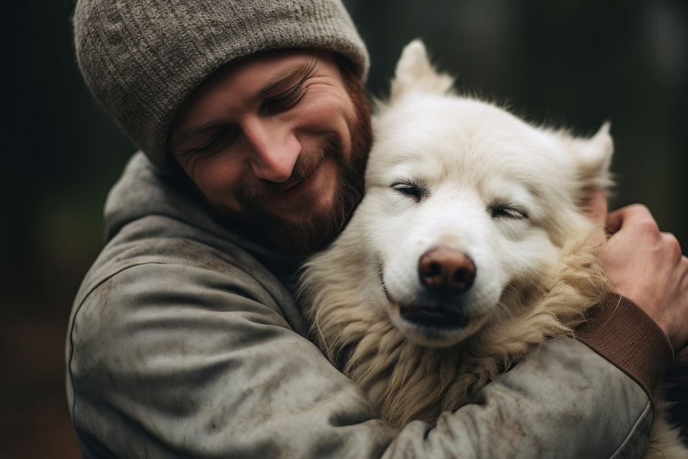 Person hugging a dog photography mammal animal.
