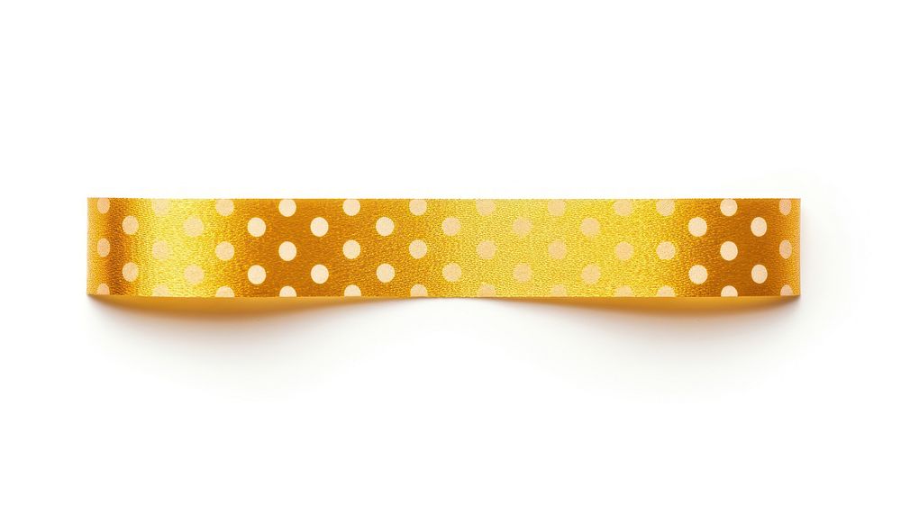 Polka dot pattern adhesive strip gold white background accessories.