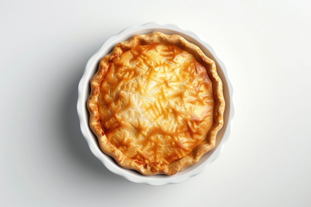 British fish pie in a white ceramic dessert pastry food.