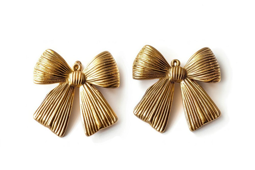 Bow earrings jewelry gold white background.